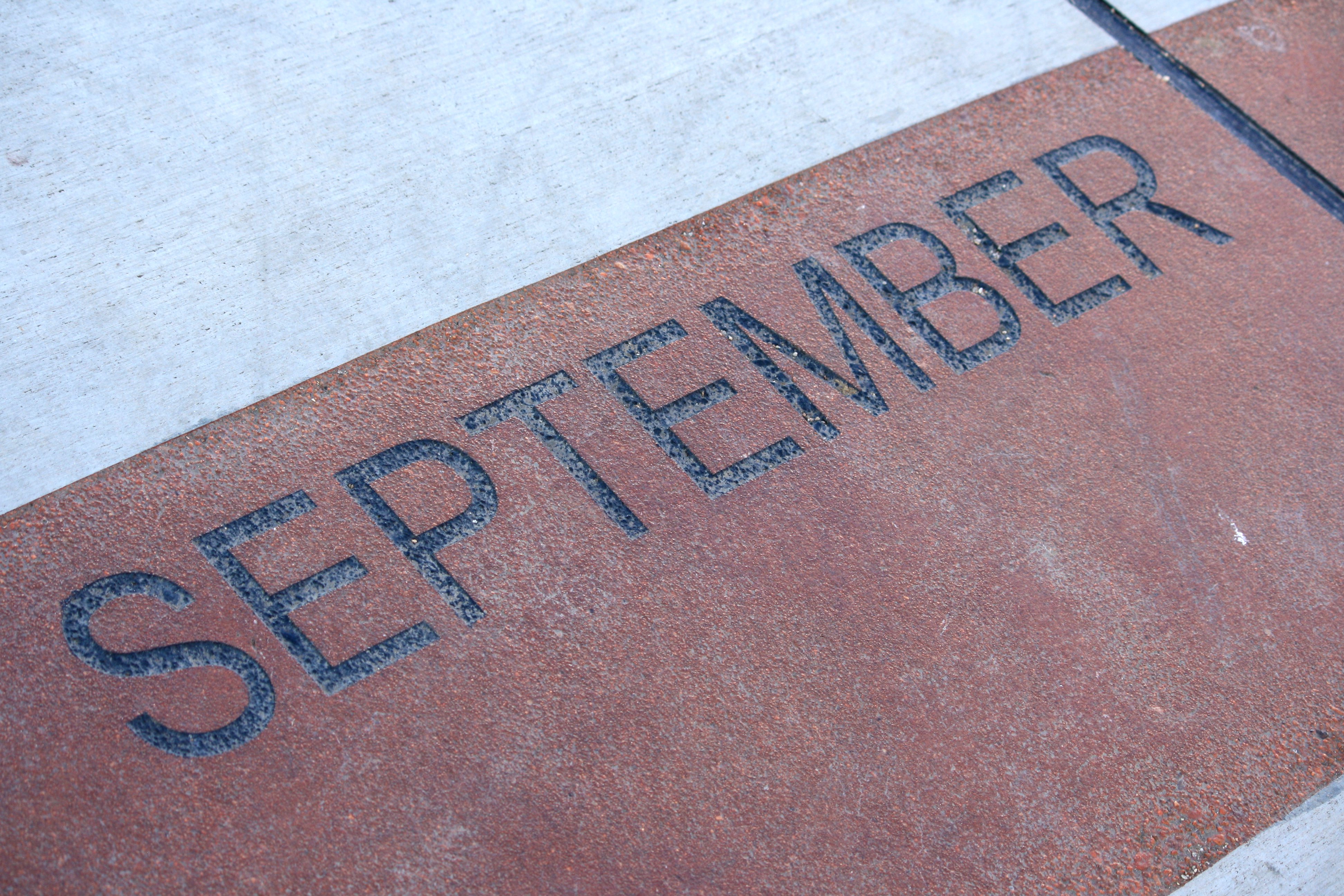 September - Free high resolution photo of the word September - part of a sidewalk solar calendar