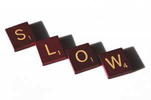 Slow spelled in Scrabble letter tiles - Free high resolution photo
