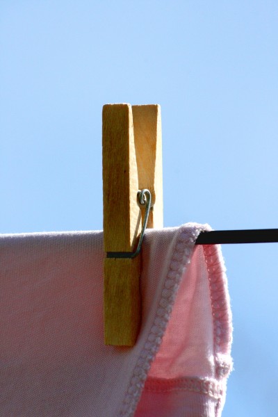 Wooden Clothespin Holding Drying Laundry on Clothesline - Free High Resolution Photo