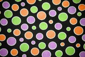 Black Fabric with pink, green and orange dots texture - Free High Resolution Photo