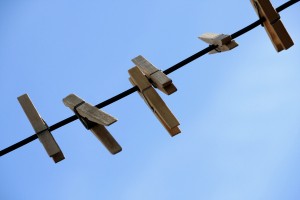 Wooden Clothespins on Clothes Line with Blue Sky in the Background - Free High Resolution Photo