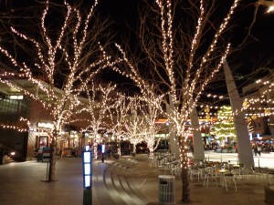 Outdoor Plaza Nighttime Scene with Skating Rink and Christmas Lights - Free High Resolution Photo