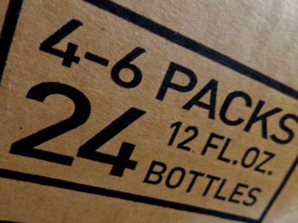 4 Six Packs - 24 Bottles - Sign Printed on Cardboard Box - Free High Resolution Photo