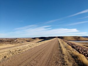 Dirt Road Across Top of Dam - Free High Resolution Photo