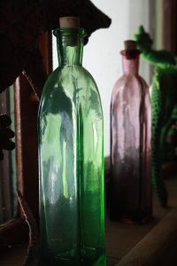 Glass Bottle in Window Sill - Free High Resolution Photo