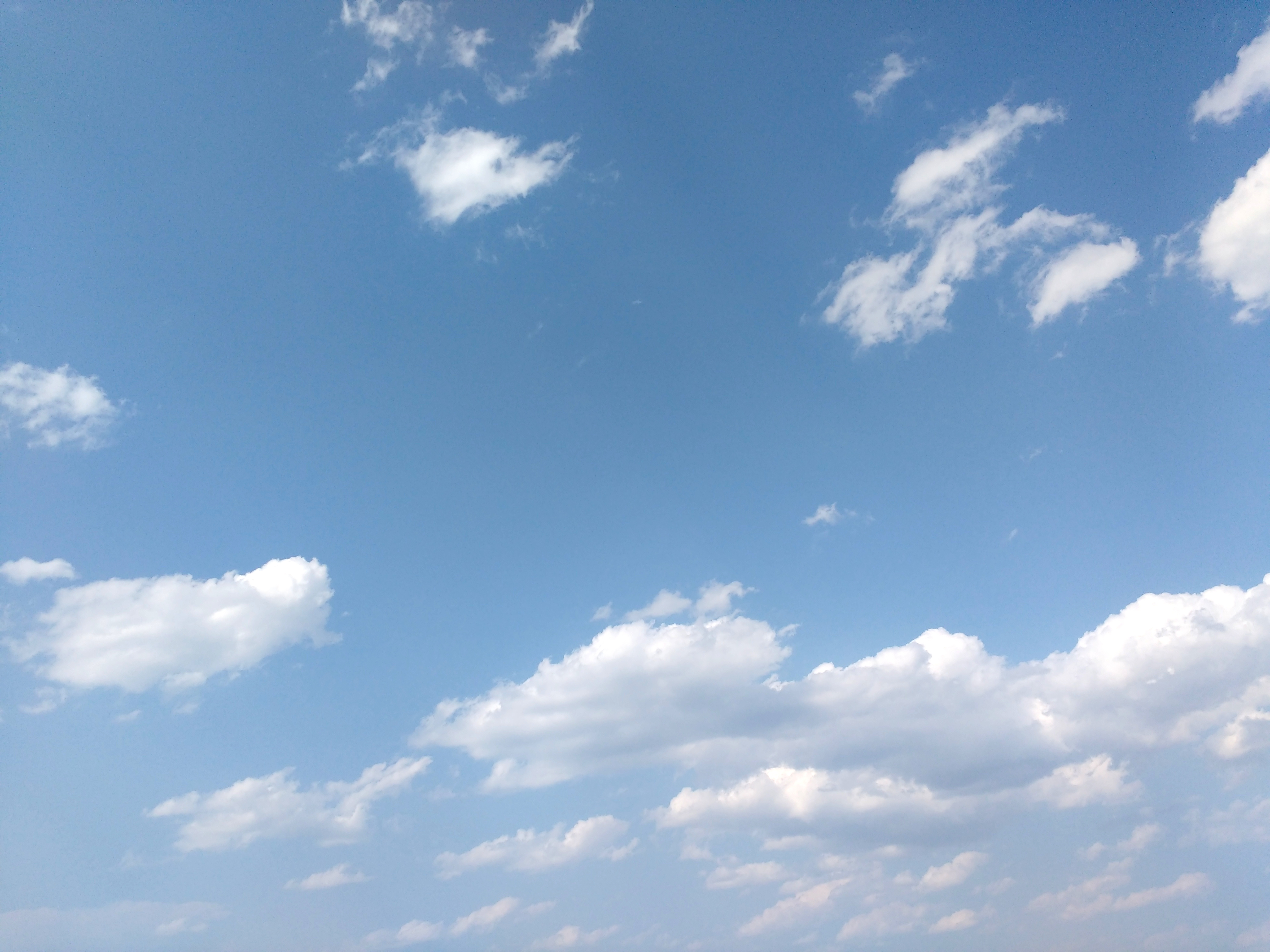 https://www.photos-public-domain.com/wp-content/uploads/2018/08/blue-sky-with-clouds-texture.jpg